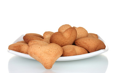 Heart-shaped cookies on white plate isolated on white