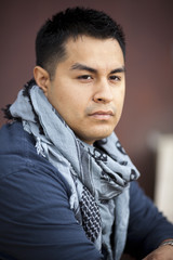 Hispanic Man - Leaning on wall