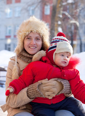 mother with toddler  in winter