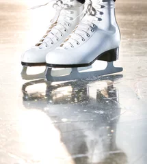 Fotobehang Dramatic natural portrait shot of ice skates © Vit Kovalcik