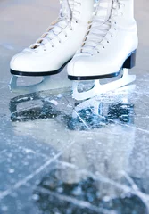 Schilderijen op glas Portrait version, woman ice skates with reflection © Vit Kovalcik