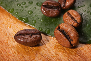 coffee beans and green leaf close-up