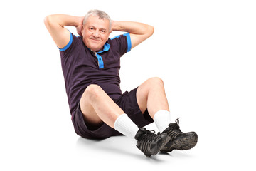 A middle age senior man exercising