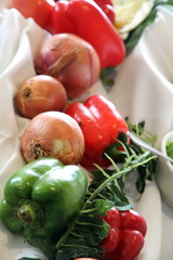 Still life with assorted peppers and onions