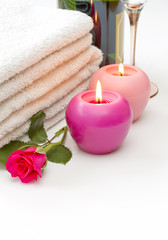 Fototapeta na wymiar Towels candles rose and wine spa concept