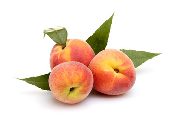 Fresh peaches isolated on white