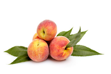 Fototapeta na wymiar Fresh peaches isolated on white
