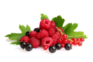 fresh raspberries and leaves isolated on white
