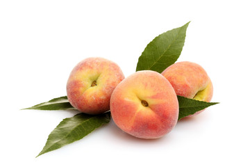 Fresh peaches isolated on white
