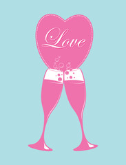 two glasses of champagne and a heart