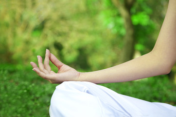 Closeup of woman hands in yoga pose