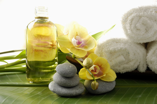 Image of spa therapy, on banana leaf background