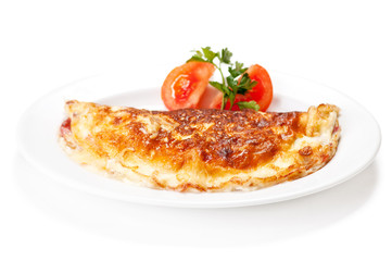 Omelet with herbs and tomatoes