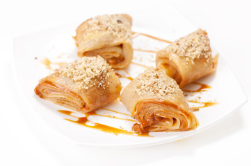 Rolled pancakes with caramel mousse