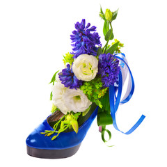 lady's shoe decorated with flowers