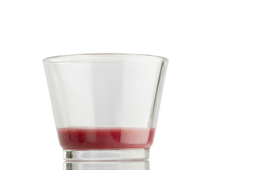 Ein fast leeres Glas Smoothie