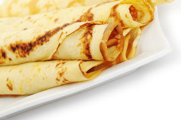 Crepe roll up a tubule on a plate