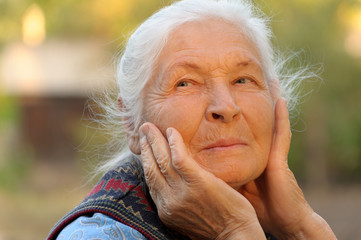 Portrait of the elderly woman