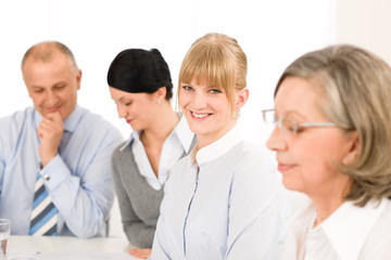 Fototapeta premium Businesswoman at team meeting with colleagues
