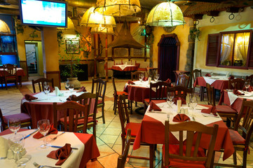 Fototapeta na wymiar Italian restaurant with a traditional interior