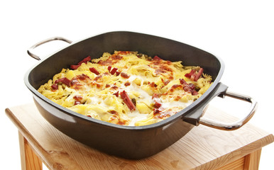baked pasta with ham and cheese Italian food