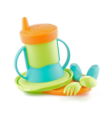 Obraz premium Multi Colored Baby Bottle and Baby utensil isolated on white