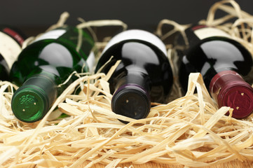 Wine bottles in straw