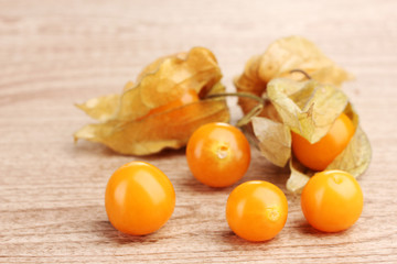 Physalis heap on wooden background