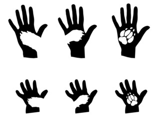 Hundepfote liegt in einer Hand, Silhouette Vektor