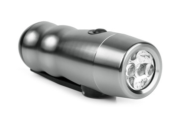 Small shining a flashlight