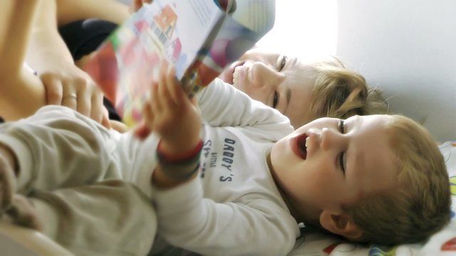 Mother and Baby Boy reading Stories