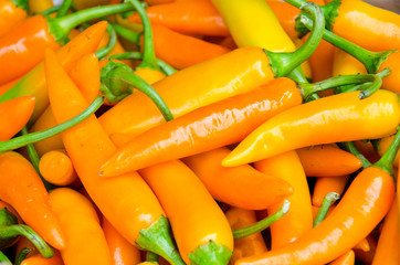 chili yellow peppers as ingredients of food.