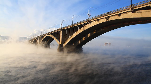 River,bridge, mist, sun.