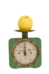 isolated vintage and grunge scale with  apple