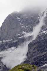 Fototapeta premium Avalanche falling from summit of Wetterhorn