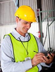 male caucasian technician working in factory