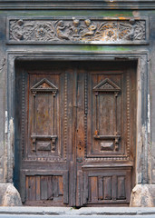 Ancient wooden door of the castle