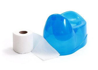 Toilet paper beside blue potty