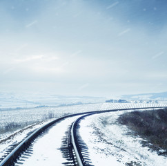 Fototapeta na wymiar Kolej w śniegu