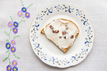 Top view of bread with lard on white plate