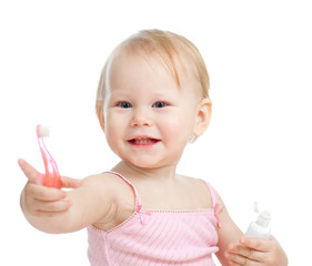 baby cleaning teeth and smiling, isolated on white background
