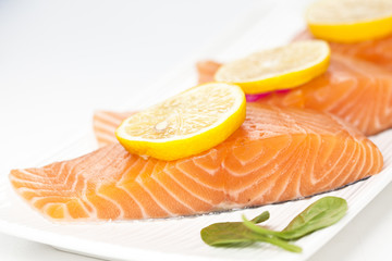fresh salmon on white background.