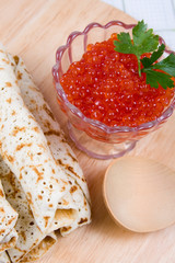 Pancakes with red caviar