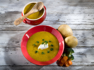 soup with carrots, broccoli, potato and sheep cheese