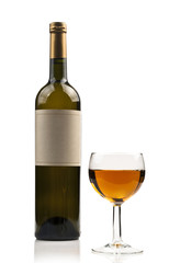 Glass and wine bottle