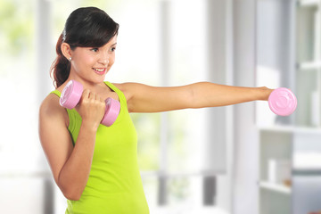 exercising with dumbbells