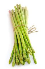 Bunch of fresh asparagus isolated on white background