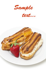 fresh cream puff with whipped cream and strawberry