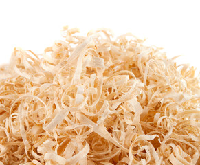 Wood shavings on white background with copy space