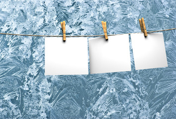Hanging blank paper on clothesline